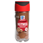 Ground McCormick Nutmeg spice in a glass jar, showing the label and rich brown color of the spice.