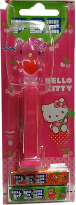 Pez candy and toy dispenser with colorful Pez candies inside, featuring the iconic Pez brand logo and packaging design.