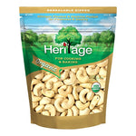 Heritage Organic Raw Broken Cashew Nuts in 250g bag, dry grocery product with visible broken cashew pieces and natural nut appearance.
