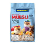 Mcgarrett Cereal Muesli Multi Fruits 1.5kg in a clear bowl, showing colorful dried fruits and oats for a healthy breakfast.