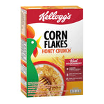 Kellogg's Corn Flakes Honey flavor cereal box, 250g, dry grocery product, with colorful packaging and images of honey-flavored corn flakes.