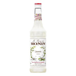 Monin Jasmine Syrup 700ml bottle, dry grocery product with a clear label and elegant packaging for gourmet beverages.