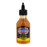 Sriraja Yellow Chilli Sauce bottle from grocery aisle, spicy condiment with bright yellow chili flavor in clear packaging