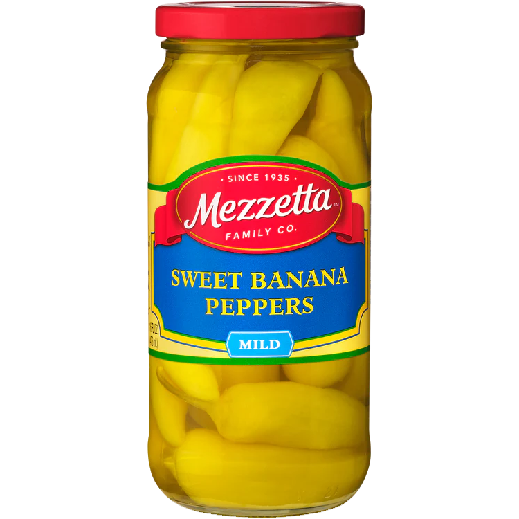 Cans of Mezzetta Sweet Peppers in a grocery store shelf, showcasing vibrant red and green peppers in clear glass jars.