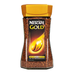 A cup of Nescafe Gold Blend coffee drink with a rich, creamy appearance and Nescafe branding on the packaging in the background.