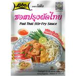Lobo Pad Thai Sauce bottle, a grocery item, with a label featuring Thai cuisine ingredients and brand logo, on a white background.