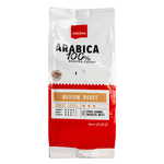 Aroma Arabica 100% coffee drink in a glass, showcasing rich coffee color and smooth texture, from the Aroma brand.