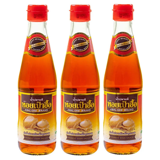 ABALONE Premium Fish Sauce 300 ml bottles shown, featuring clear glass bottles with dark liquid and label, ideal for Asian cuisine cooking