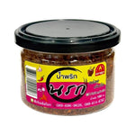 Chada Red Eye Chili Paste Rat in dry grocery packaging, showcasing vibrant red chili paste in a sealed jar.