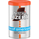 Nescafe Azera Decaff Americano coffee drink in a clear glass with a dark coffee color and a frothy top.