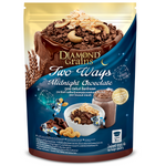 Diamond Grains Granola Two Ways Midnight Choco in a clear bowl with chocolate and vanilla flavors, ready for breakfast or snacking.