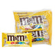 M&M's Chocolate Peanut candies in 37g packs, featuring colorful coated chocolates with peanut centers, stacked in a display.