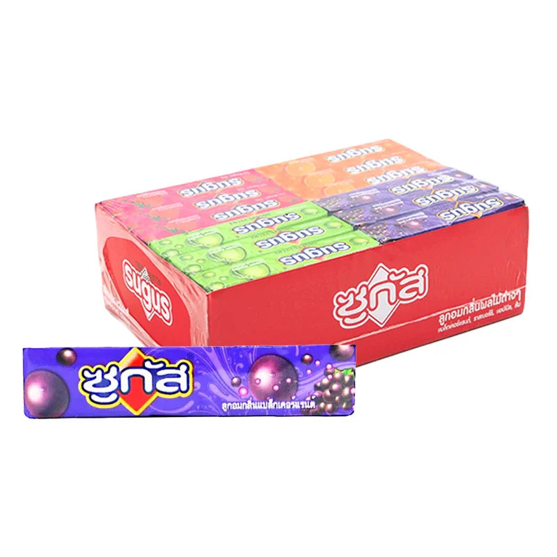Assorted SUGUS soft candy mix in 30g packs, featuring colorful, chewy candies displayed in a variety of shapes and flavors.
