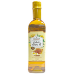 Organic Thai wildflower honey in a glass jar, showcasing its golden color and natural texture.