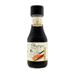 Deksomboon Shoyu soy sauce bottle, 125ml, in clear glass with dark liquid, for cooking and seasoning in Asian cuisine.