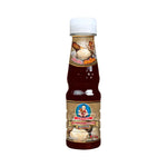 Deksomboon Oyster Sauce Thick 165g jar, a popular dry grocery product with a rich, savory oyster flavor in a glass container.