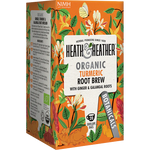 Heath and Heather Turmeric Root Brew organic drink in a glass, showcasing the vibrant yellow color of the turmeric root brew.