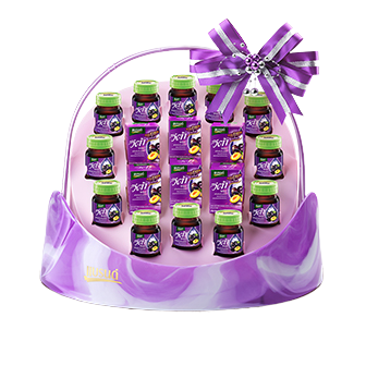 Bottle of Brand's Hamper Veta Prune Essence Conc Drink, a grocery product with a clear label and dark liquid inside.