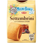 Barilla Mulino Bianco Settembrini confectionery snacks, golden baked cookies with filling, placed on a white plate.
