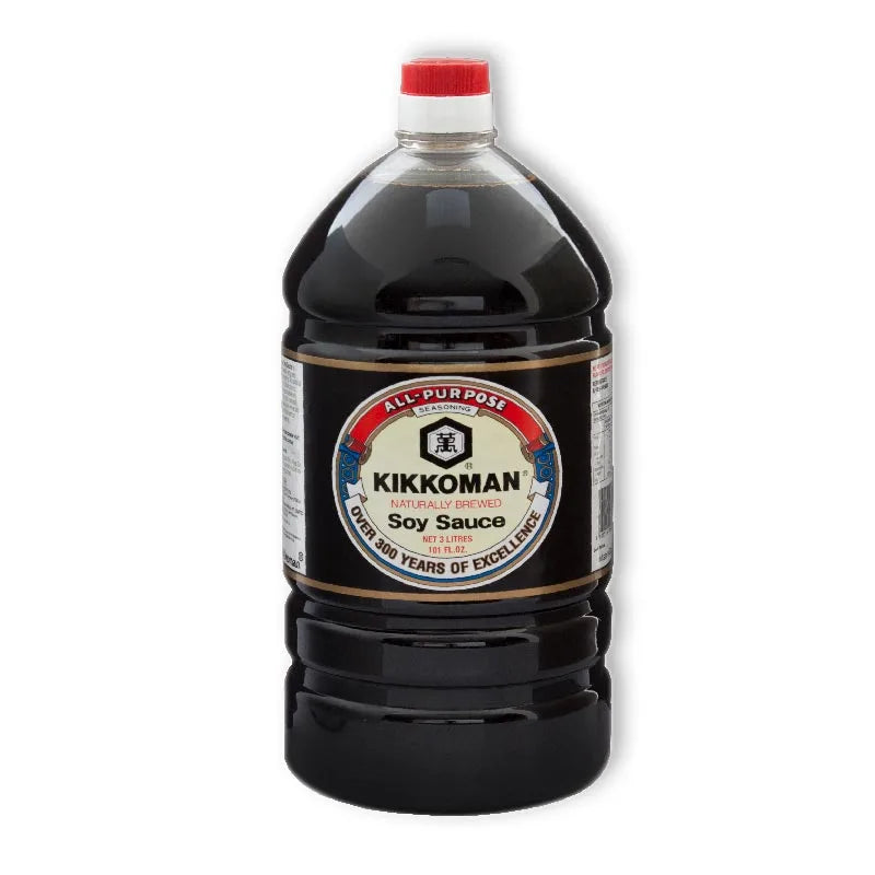 KIKKOMAN soy sauce bottle, 3-liter size, with label showing traditional Japanese branding and dark soy liquid inside.