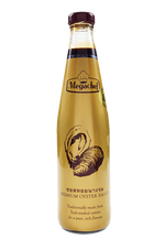 Bottle of Megachef oyster sauce for cooking, with a label displaying the brand and product name, on a plain background.