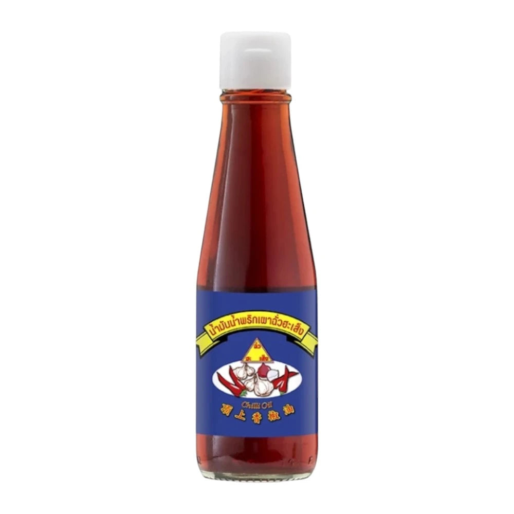 Chua Hah Seng Chilli Paste Oil in 190ml bottle with red chili and oil visible, ready for cooking or flavoring dishes.