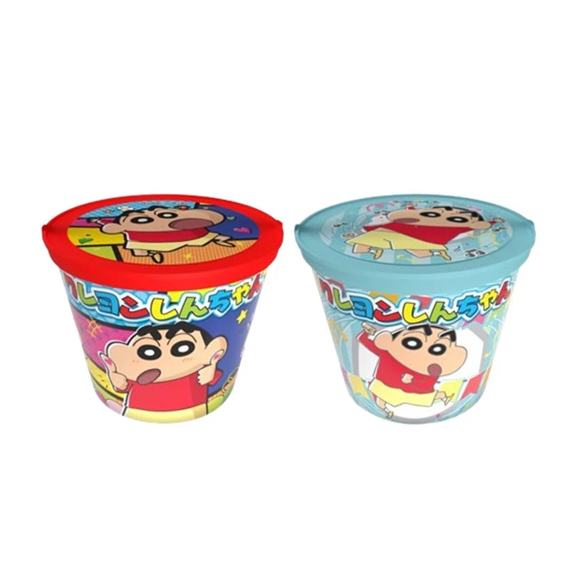 SHINCHAN random bin with two biscuit packets, four snack packets, two candy packets, and two 49.9g Shin Chan dolls, colorful packaging.