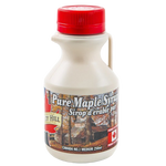 Turkey Hill Jug Maple Syrup in a clear plastic bottle, showing the golden amber syrup inside.