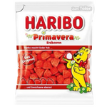 Colorful Haribo Primavera confectionery snacks with vibrant fruit-shaped gummies in a clear bag.