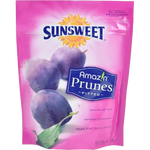 Sunsweet Sweet Prunes in a clear bowl, showing glossy, dark dried fruit as a healthy confectionery snack.
