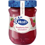 Hero Raspberry Jam jar with bright red raspberry jam spread on a spoon, showcasing fresh fruit and smooth texture.