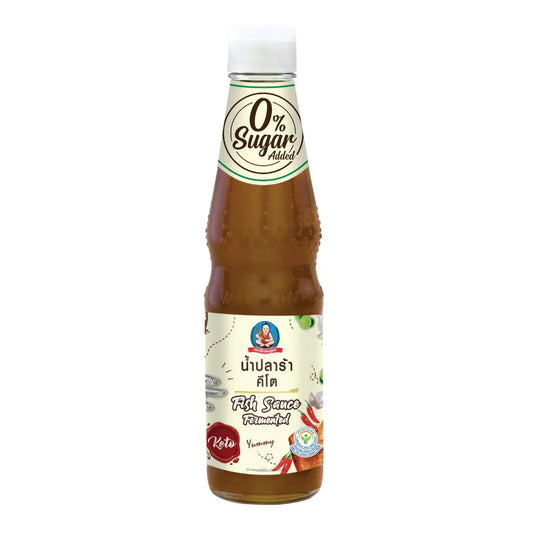 DEKSOMBOON Keto Fermented Fish Sauce 340g bottle, close-up of the dark, savory fermented fish sauce in a glass bottle.