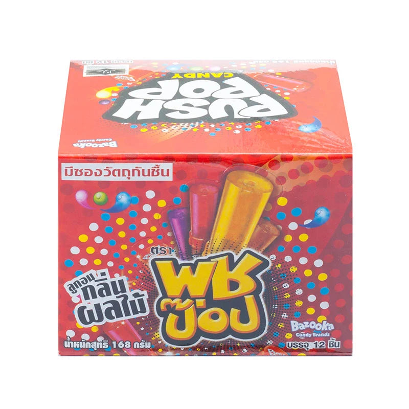 Assorted PUSH POP candy push pops with fruity orange, grape, strawberry, and cola flavors in colorful packaging.