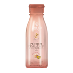 Squid Premium Fish Sauce first extract with Himalayan salt in a clear glass bottle, showing the dark, rich liquid inside.