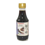 Bottle of Takao Mentsuyu sauce for cooking and seasoning, with a label showing Japanese characters and branding.