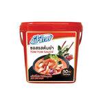 Fathai Tom Yum Sauce 900g jar, Thai-style spicy and tangy sauce for cooking or dipping, in a clear glass jar with label