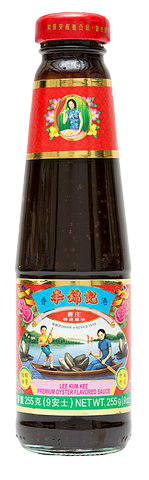 Bottle of Lee Kum Kee Oyster Sauce for cooking, featuring the brand label and dark soy sauce in a grocery setting.