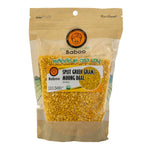 Baboo organic split green gram (moong daal) confectionery snack in a bowl, showcasing vibrant green split lentils.