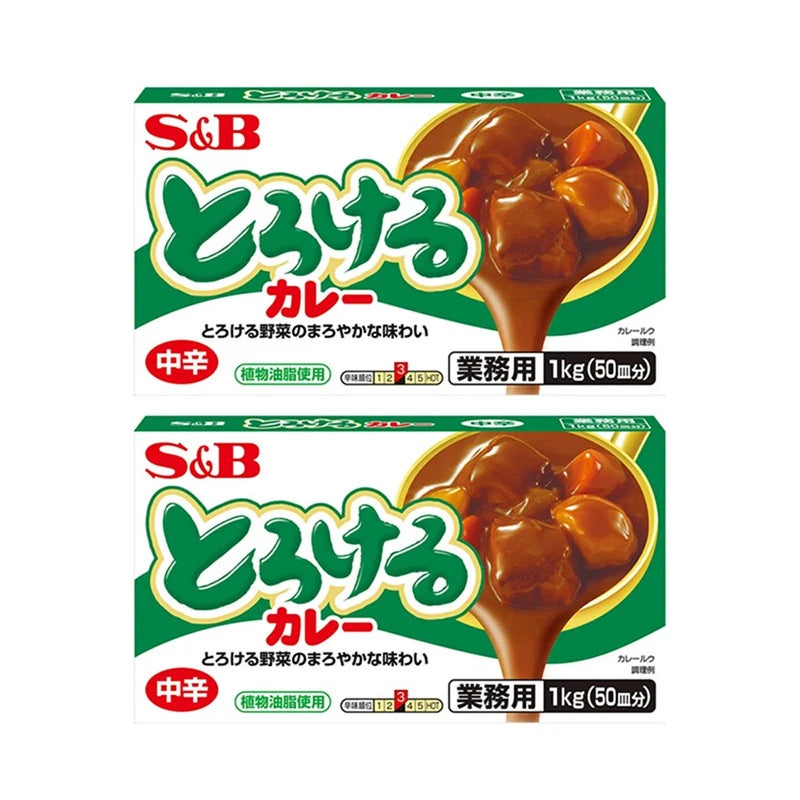 S & B Torokeru Curry Sauce Mix Medium Hot with potato flakes in two 1kg boxes, ready for cooking or serving.
