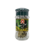 Dried Nguan Soon Bay Leaves in a clear container, showcasing the aromatic grocery herbs used for cooking and flavoring dishes.