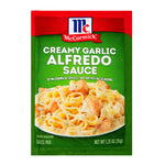 Jar of McCormick Alfredo Pasta Sauce with a label featuring the brand name and creamy white sauce visible.