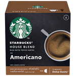 Starbucks Americano House Blend medium roast coffee drink in a clear glass, showcasing its rich color and smooth texture