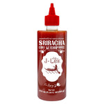 J-LEK Sriracha Chili Sauce mixed with tomatoes in a 510g jar, perfect for adding spicy flavor to dishes.