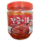JANG GEUMI Kimchi 1 kg jar with fermented Korean cabbage and spices, ready for serving.