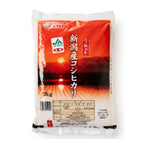 Koshihikari Japanese rice 2kg, dry grocery, packaged white rice with clean, polished grains in a clear bag.
