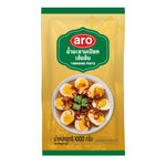 Aro Tamarind Paste 1kg in a clear container, showcasing the dark, thick paste used in cooking and flavoring dishes.