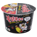 Spicy Samyang Hot Chicken Bowl in a bowl with noodles, chicken, and seasoning, ready to eat.