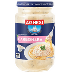 Jar of Agnesi Pasta Sauce Carbonara, Italian-style creamy pasta sauce with herbs and spices, in a glass jar.