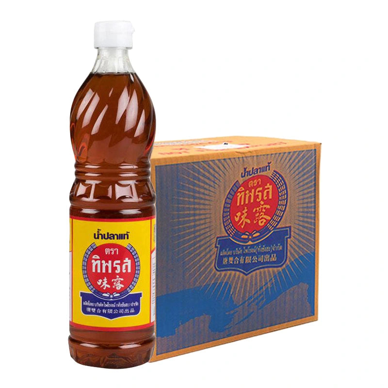 Tiparos Fish Sauce 700ml bottle, Thai-style condiment with dark liquid, used for cooking and flavoring Asian dishes.