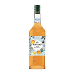 Giffard Mixology Mango 1L bottle of mango-flavored syrup for cocktails and beverages, in a clear plastic container.